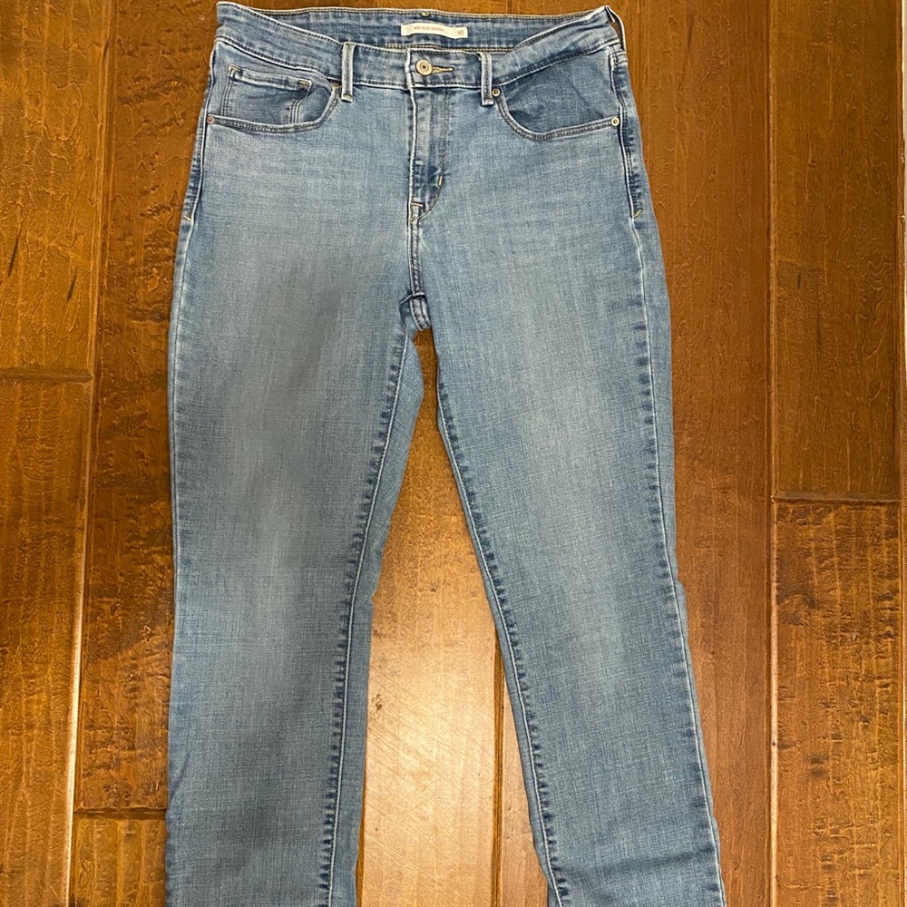 LEVIS MID RISE JEAN SIZE 10